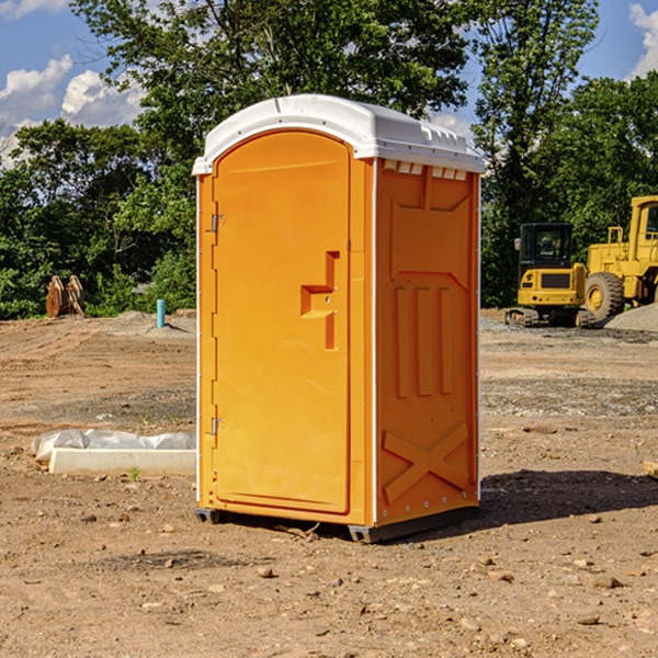 what is the cost difference between standard and deluxe portable restroom rentals in Pecos County